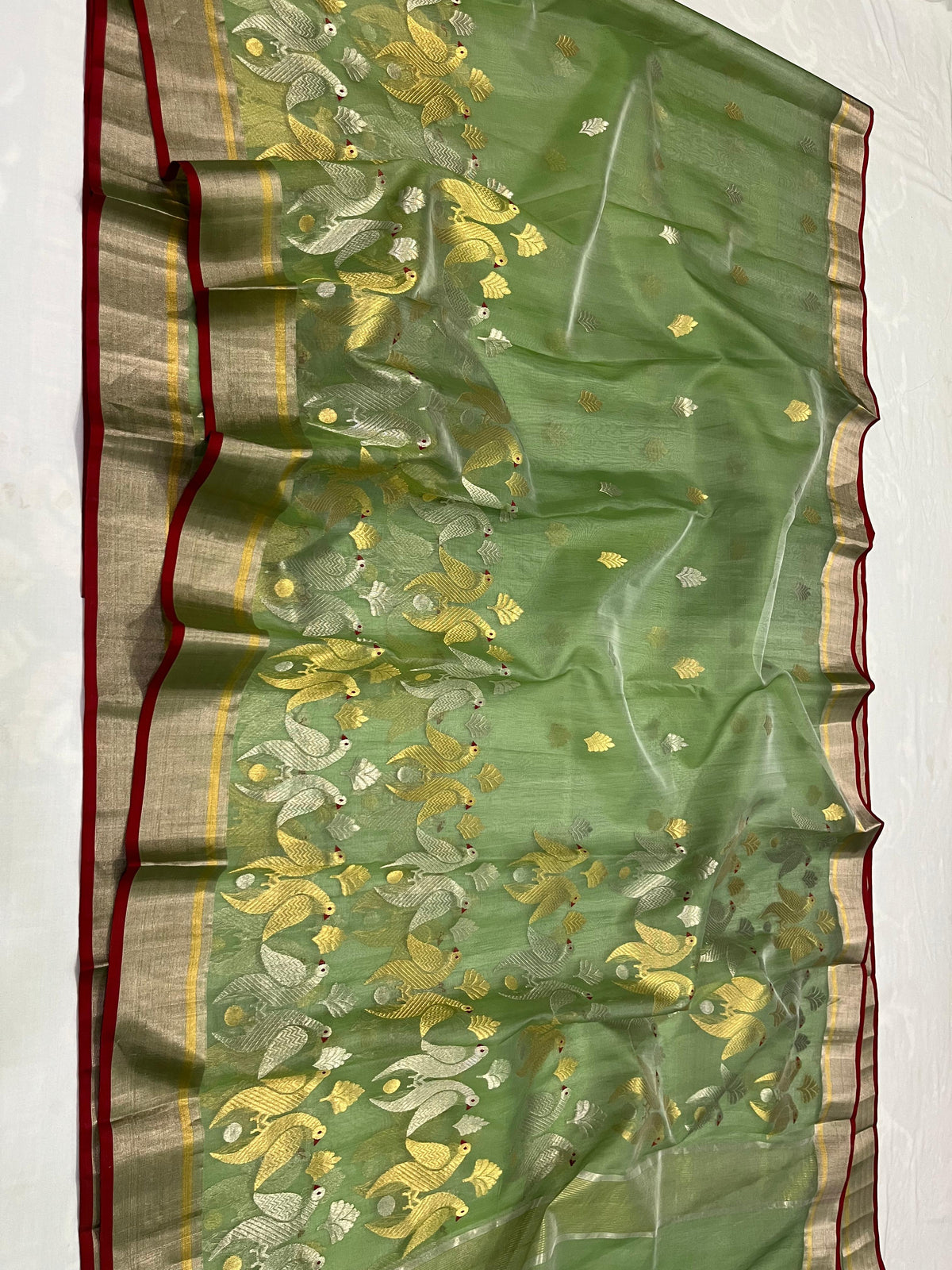 Green color with Peacock design and golden border Chanderi Saree
